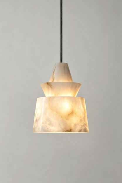 Tobiah Tiered Alabaster Pendant Light | Natural Alabaster and Metal | Full view of the pendant light displayed gracefully on a plain grey wall | vexa lamps