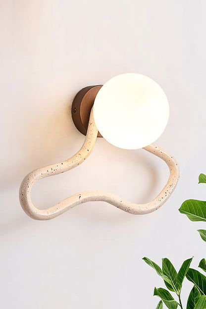 Side view of lit travertine flow wall light | Travertine, Glass, Wood | Showing the warm illumination through glass and stone | vexa lamps