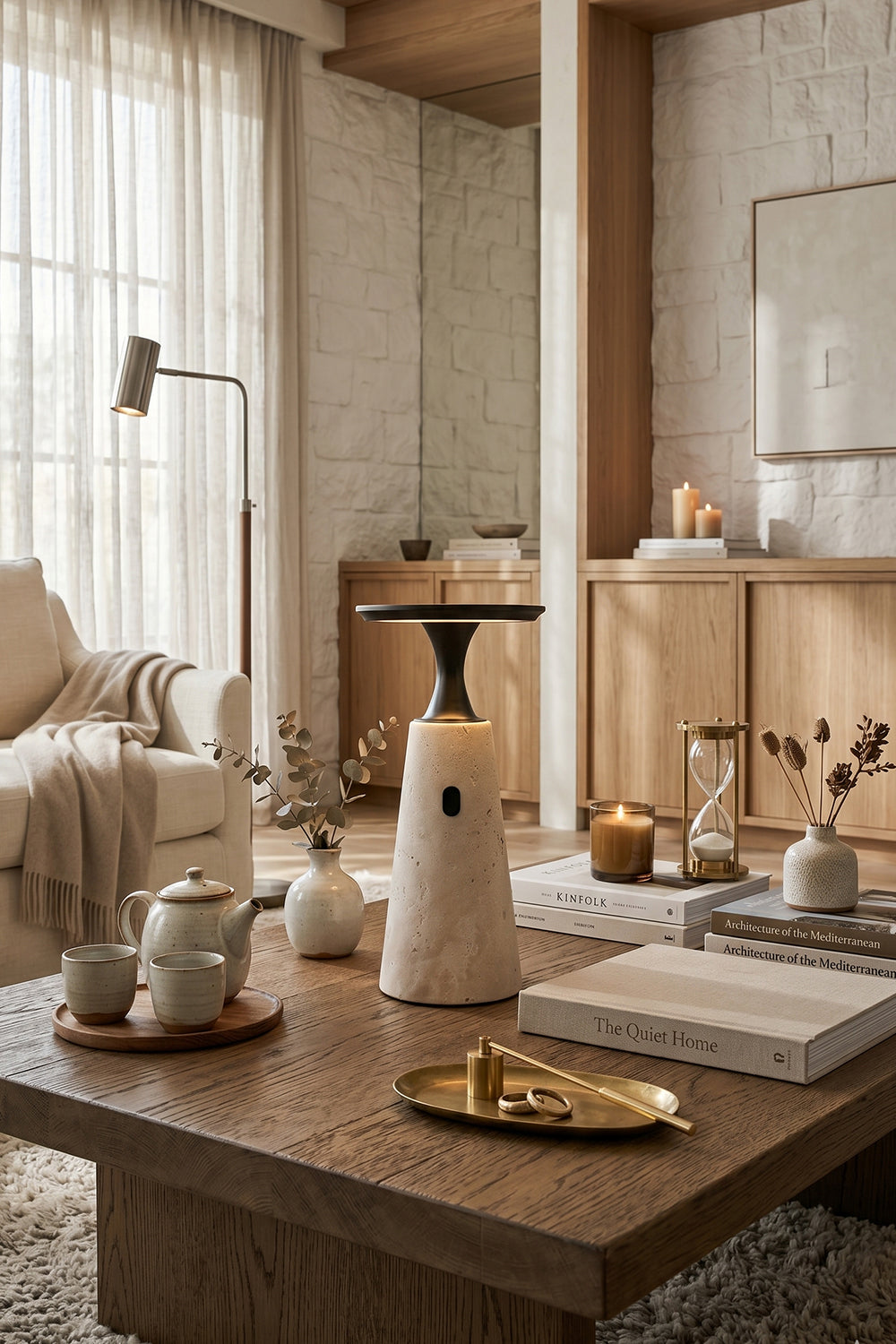 Travertine Obelisk Table Lamp | Metal, Travertine | Placed on wooden coffee table in contemporary lounge | vexa lamps