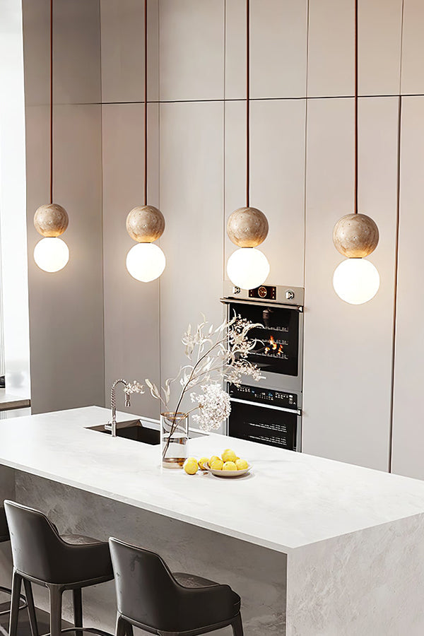 4-light linear travertine pendant light | Yellow Travertine, Glass | Kitchen island installation with sleek modern decor | vexa lamps