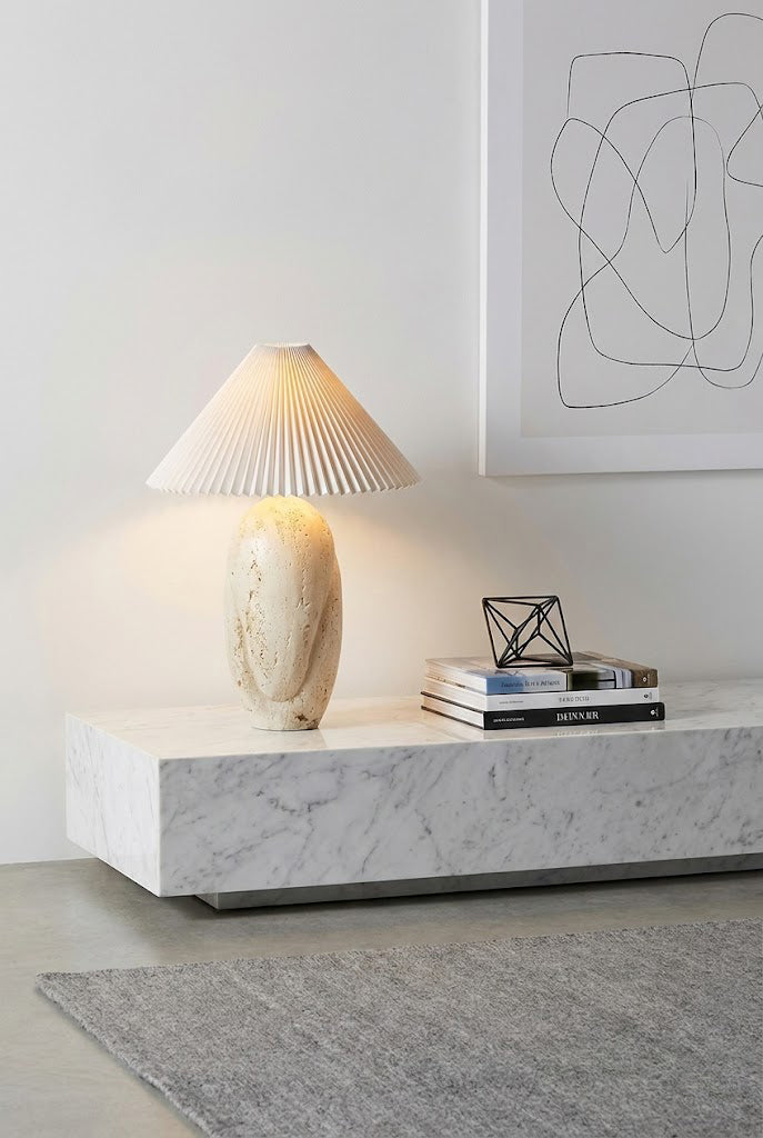 Travertine stone lamp in a modern living room | Travertine, Fabric | On a marble console near minimalist wall art | vexa lamps