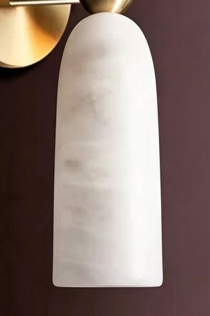 Vesperal Axis Alabaster Wall Lamp | Alabaster, Metal | Detailed macro view of the carved alabaster shade showing organic veining and smooth finish | Detail shot | vexa lamps