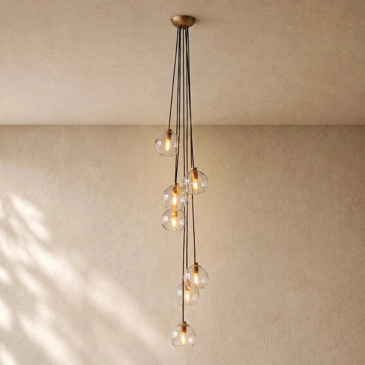 Bubble Glass Cascade Pendant - 7-Globe / Lacquered Burnished Brass / Clear