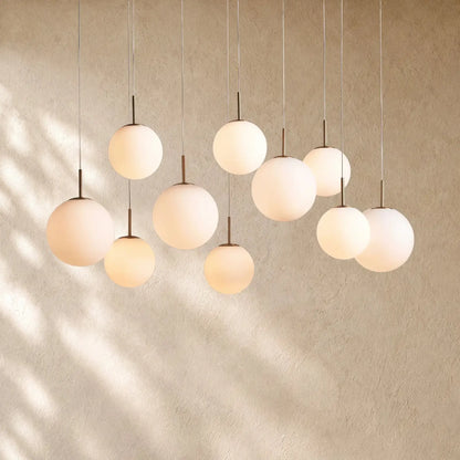 Casenin Modern Linear Chandelier - 55’’ 10-Light / Matte Opal